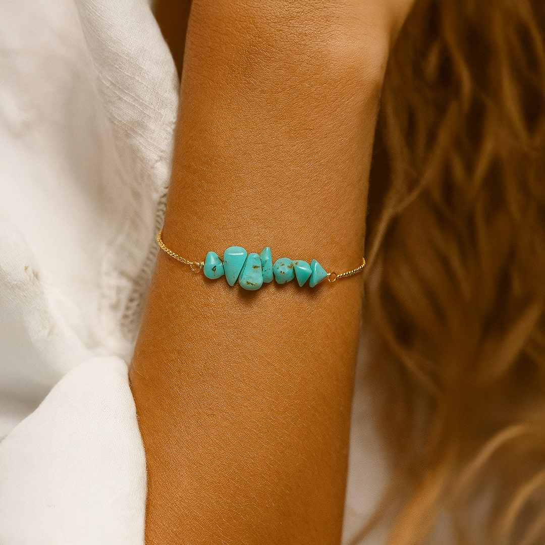 Lifestyle shot of multiple bracelets stacked - KARMAKIND
