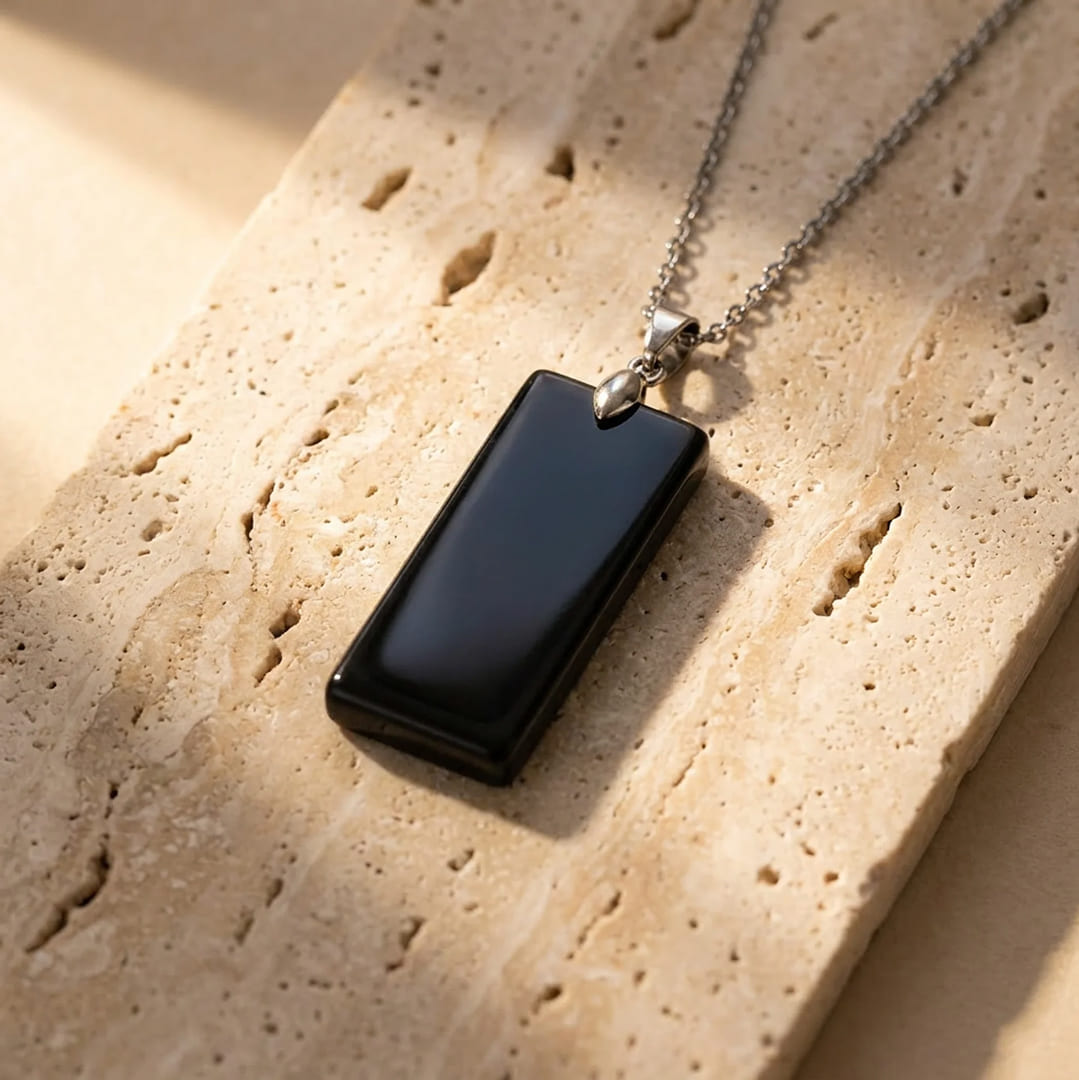 Close-up of Black Obsidian stone on the men's pendant - KARMAKIND