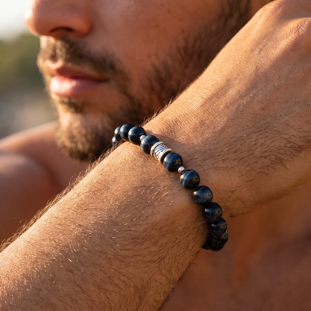 Close-up of deep blue and black Hawk's Eye beads - KARMAKIND