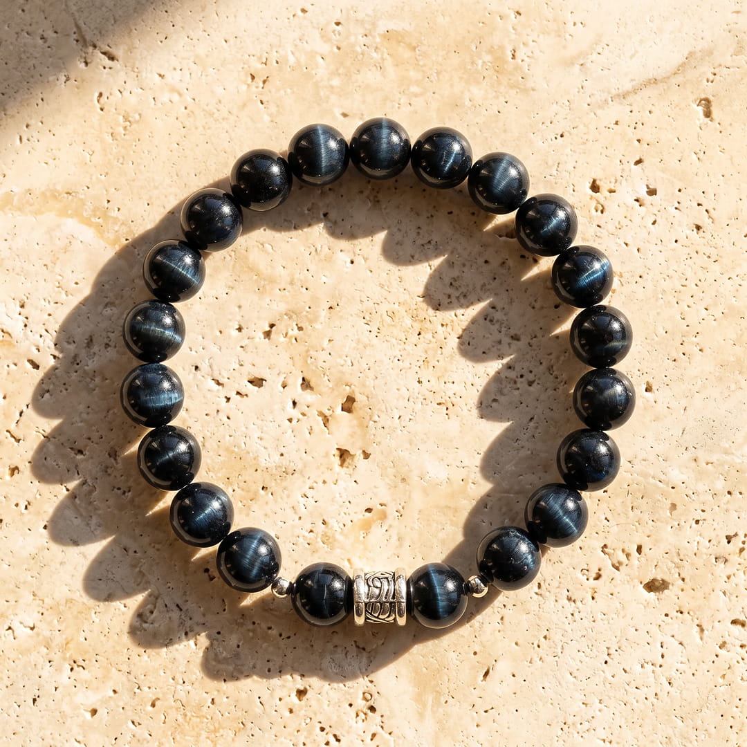 Woman's wrist with the Hawk's Eye bracelet - KARMAKIND