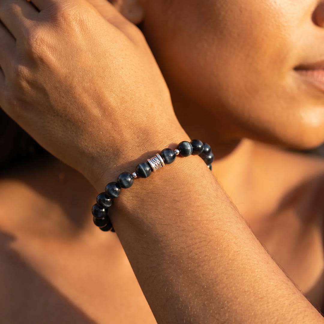 Stack of bracelets including the Hawk's Eye - KARMAKIND