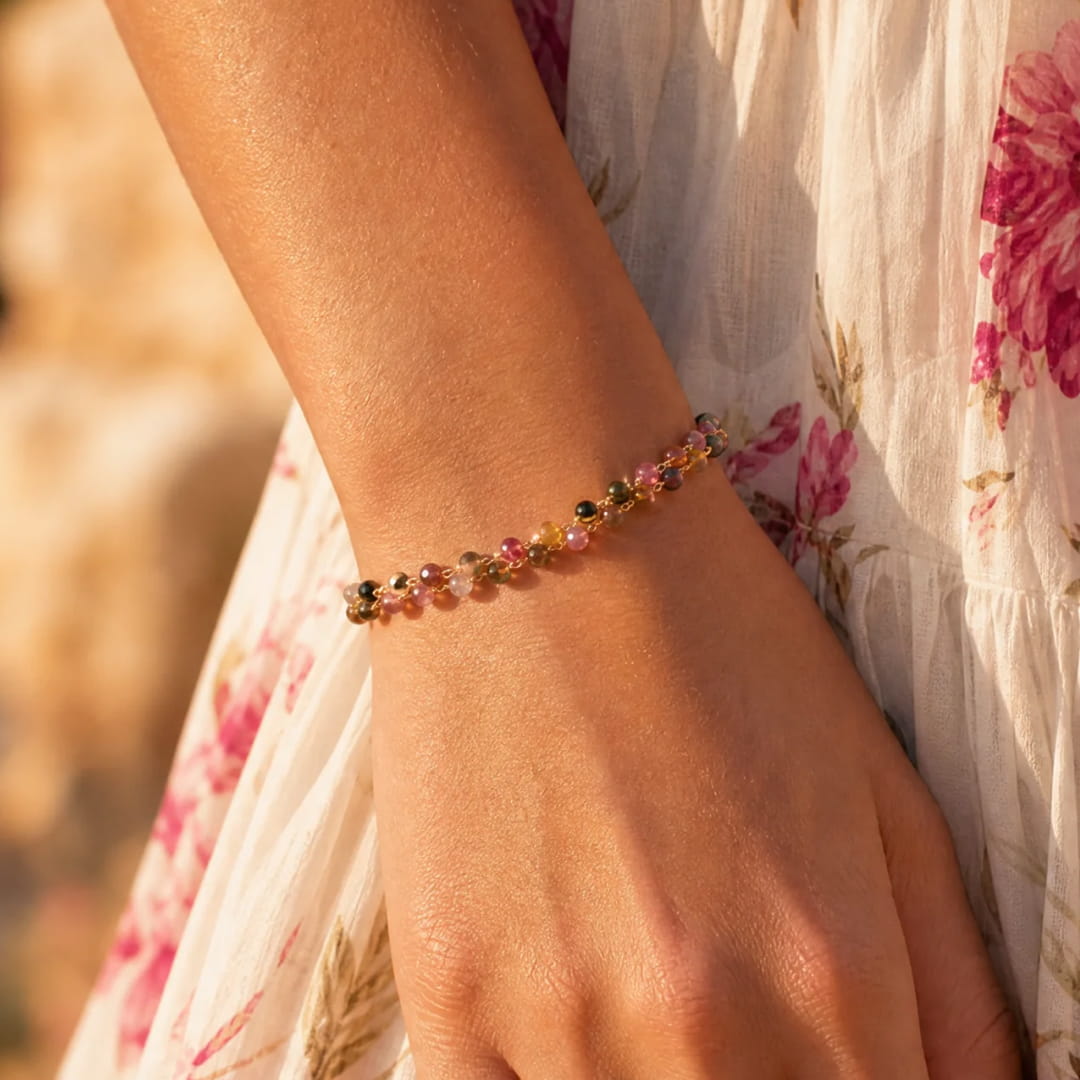 Close-up of vibrant tourmaline beads on bracelet - KARMAKIND