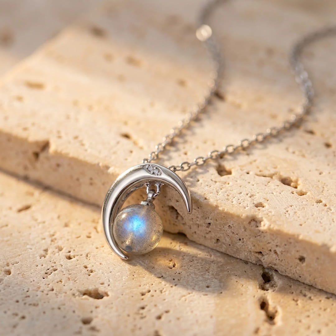 The 'Enchanted Moon' necklace being worn, showing its delicate design - KARMAKIND