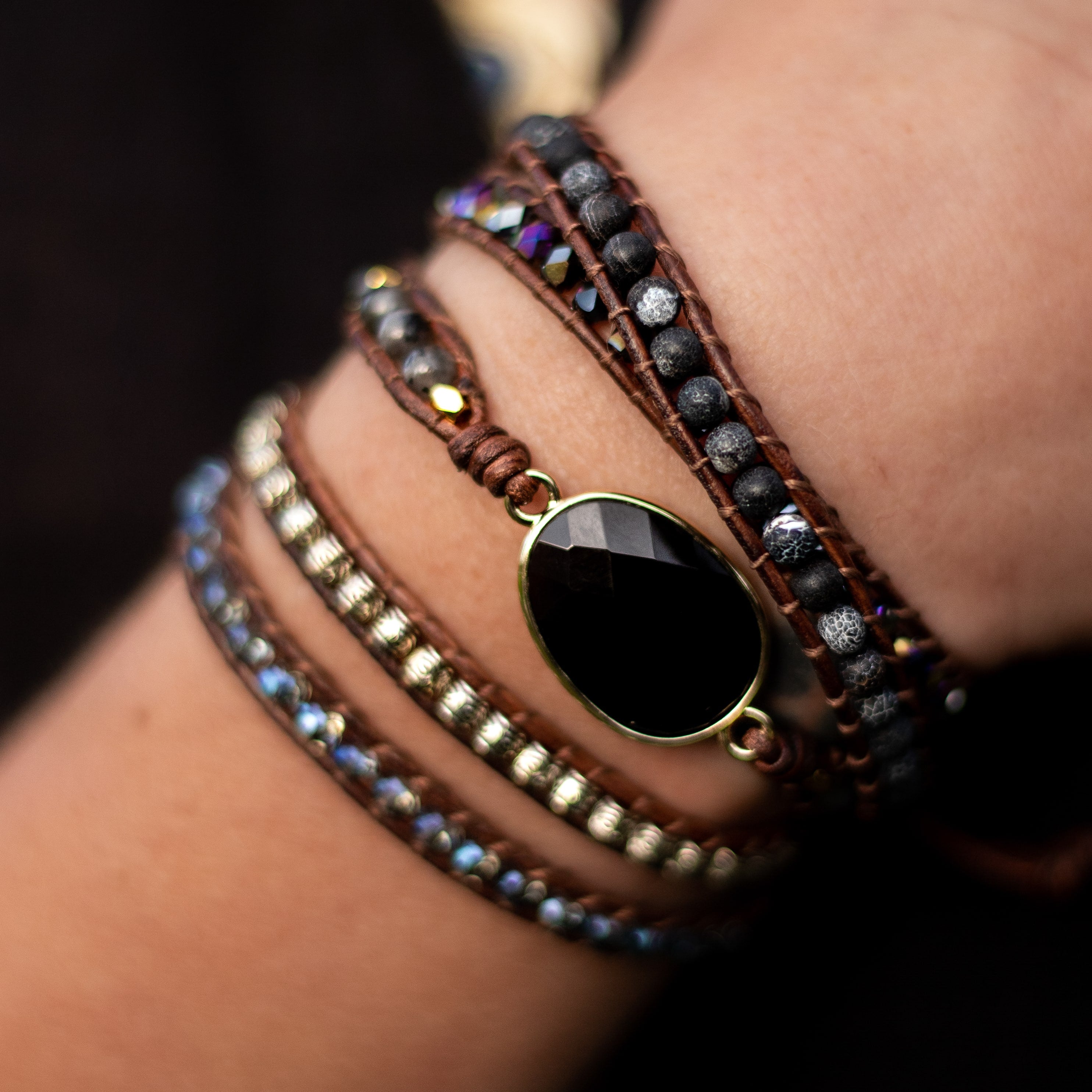 Close-up of black onyx stones on the wrap bracelet