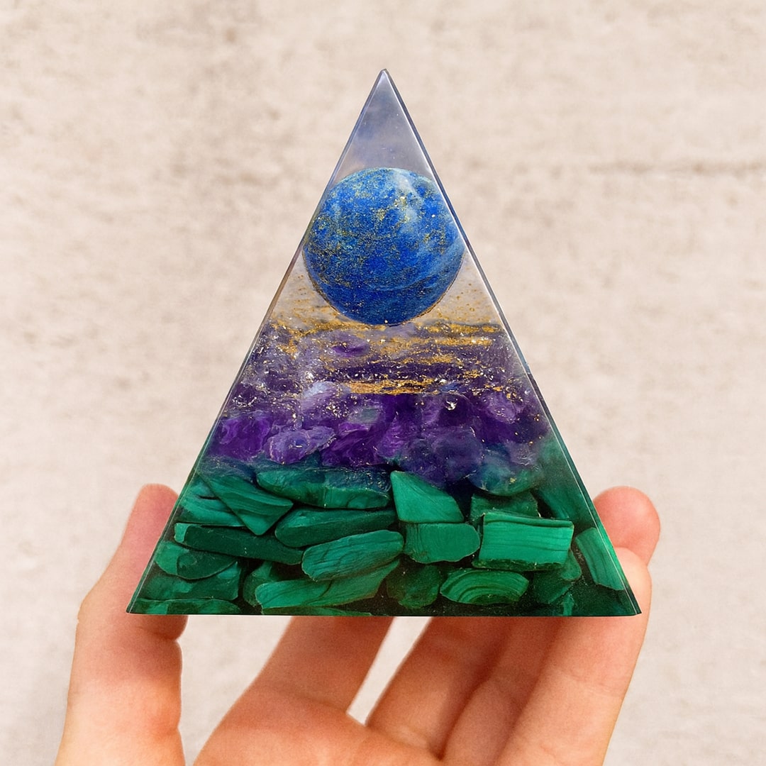 Close-up of the Lapis Lazuli sphere, resembling a blue moon, within the orgonite - KARMAKIND