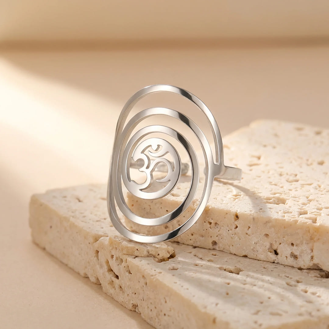 Ring detail showing the Om symbol and circular pattern - KARMAKIND