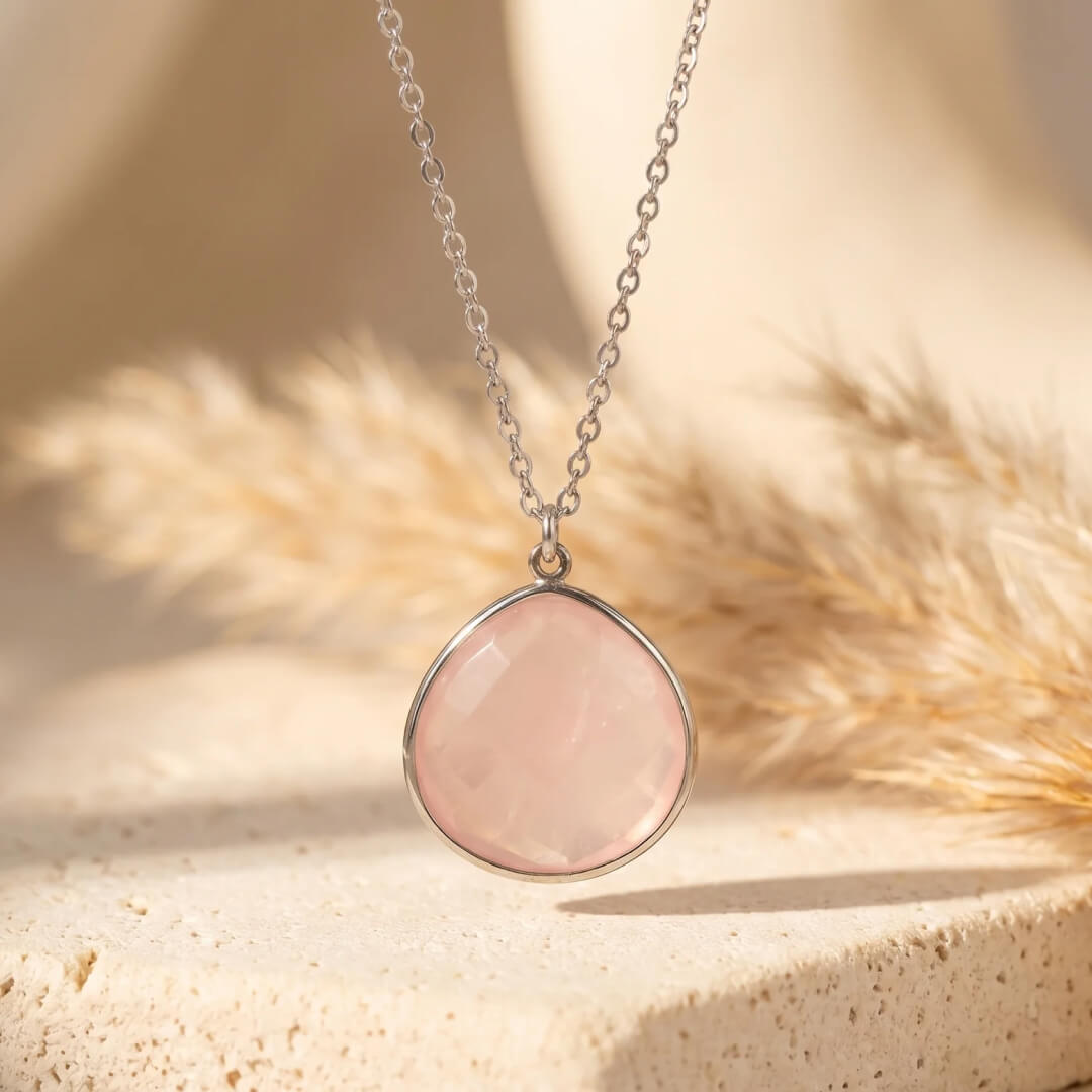 The teardrop shape of the Rose Quartz pendant - KARMAKIND