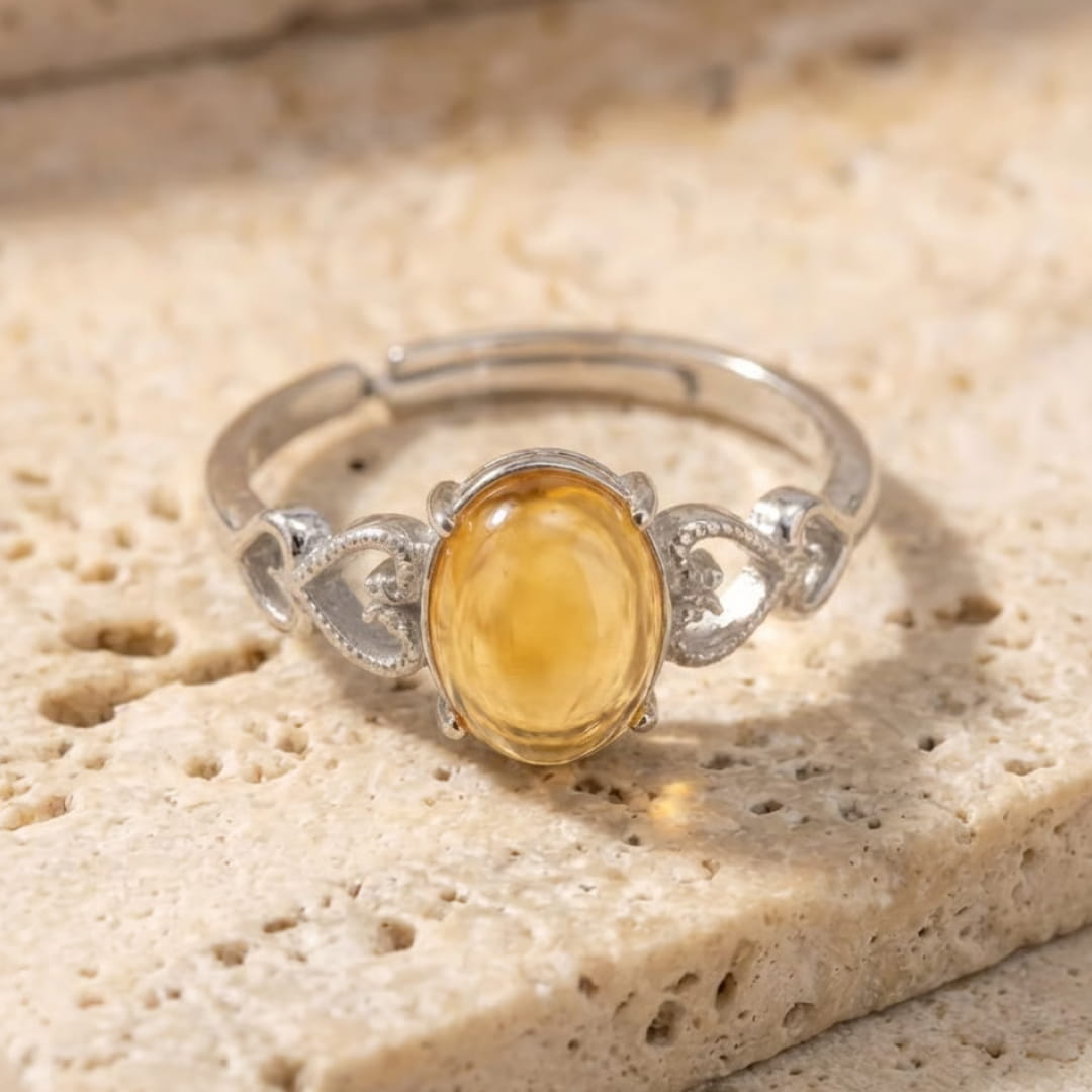 Lifestyle image of the citrine ring on a finger - KARMAKIND