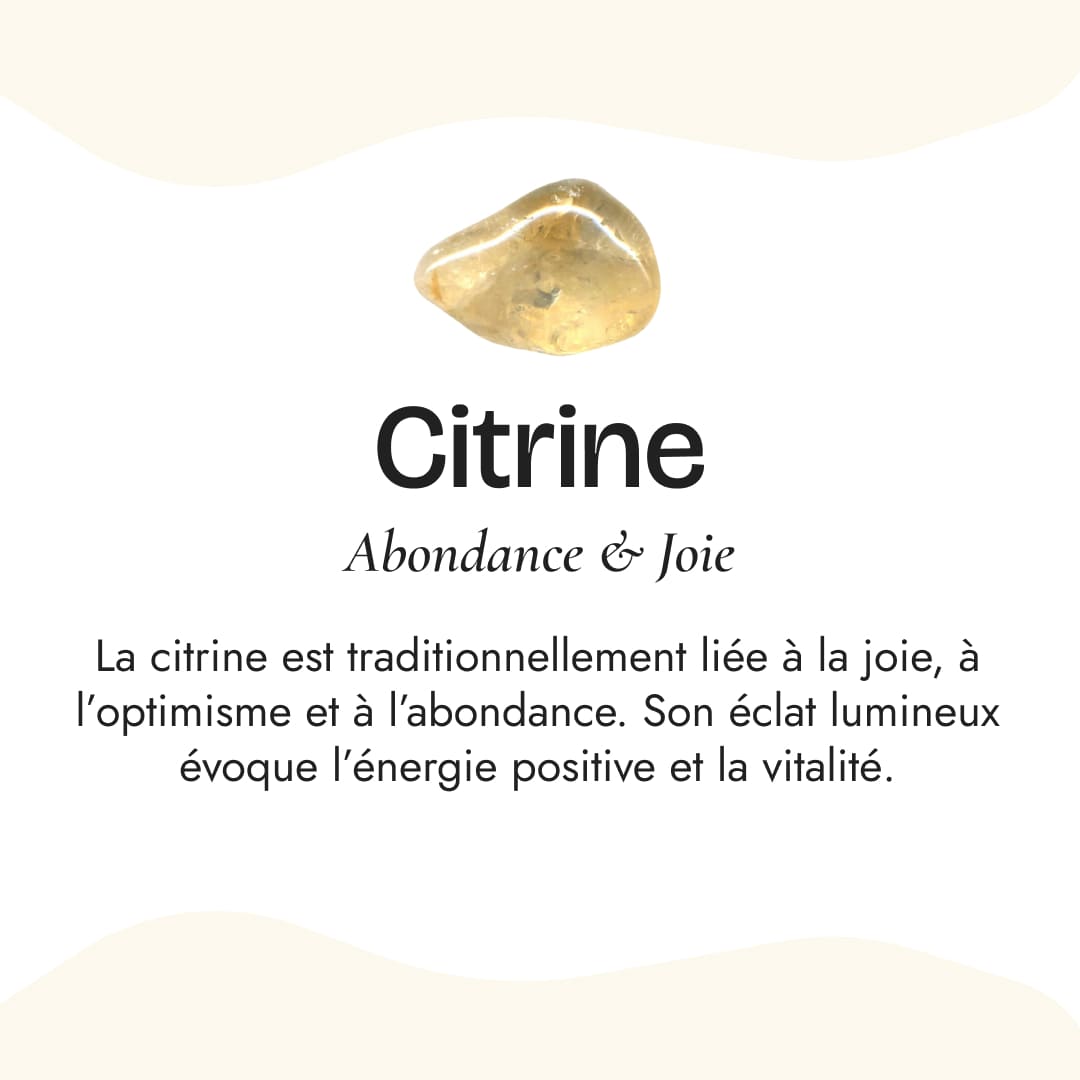 The citrine ring displayed with other KARMAKIND jewelry