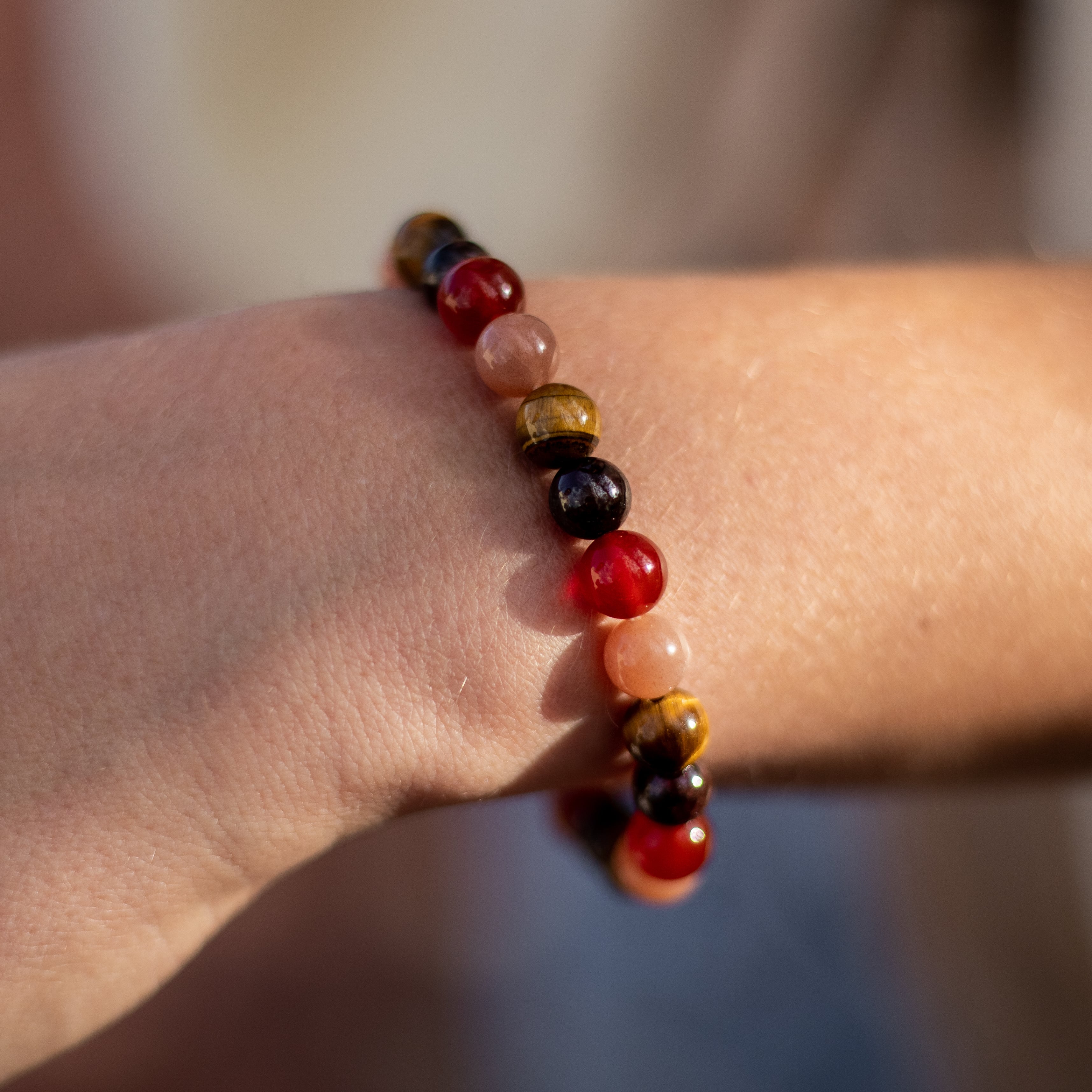 Close-up of the warm colors in the gemstone bracelet - KARMAKIND