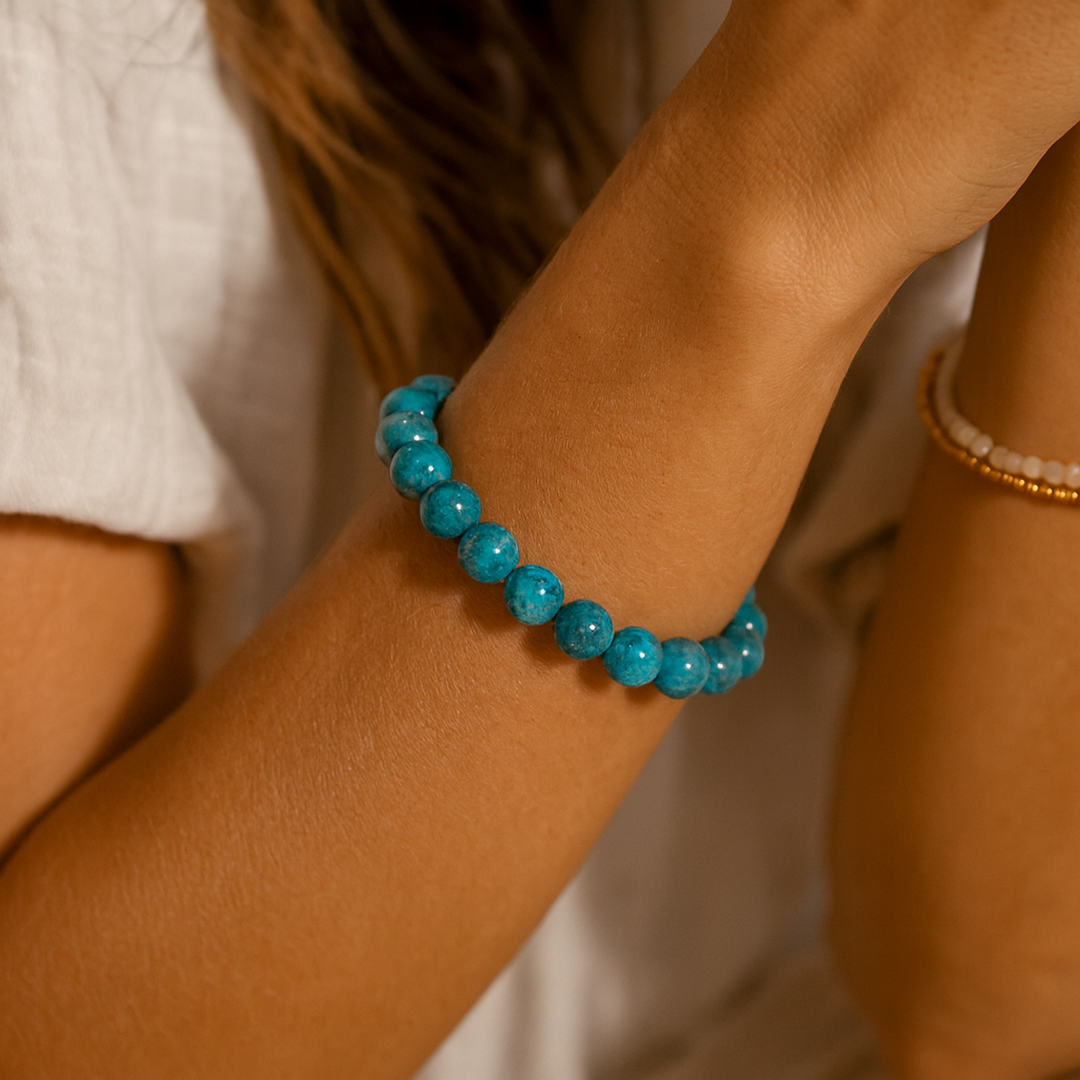 Close-up of luminous apatite beads - KARMAKIND