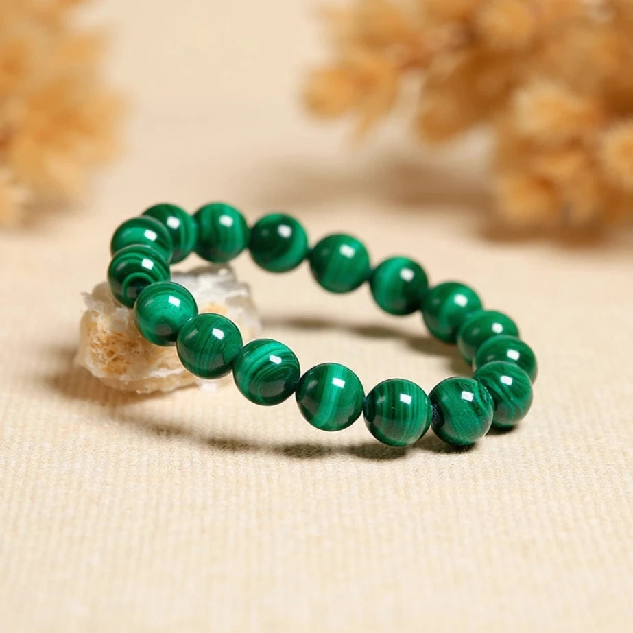 Malachite Renewal Bracelet showing deep green circles - KARMAKIND
