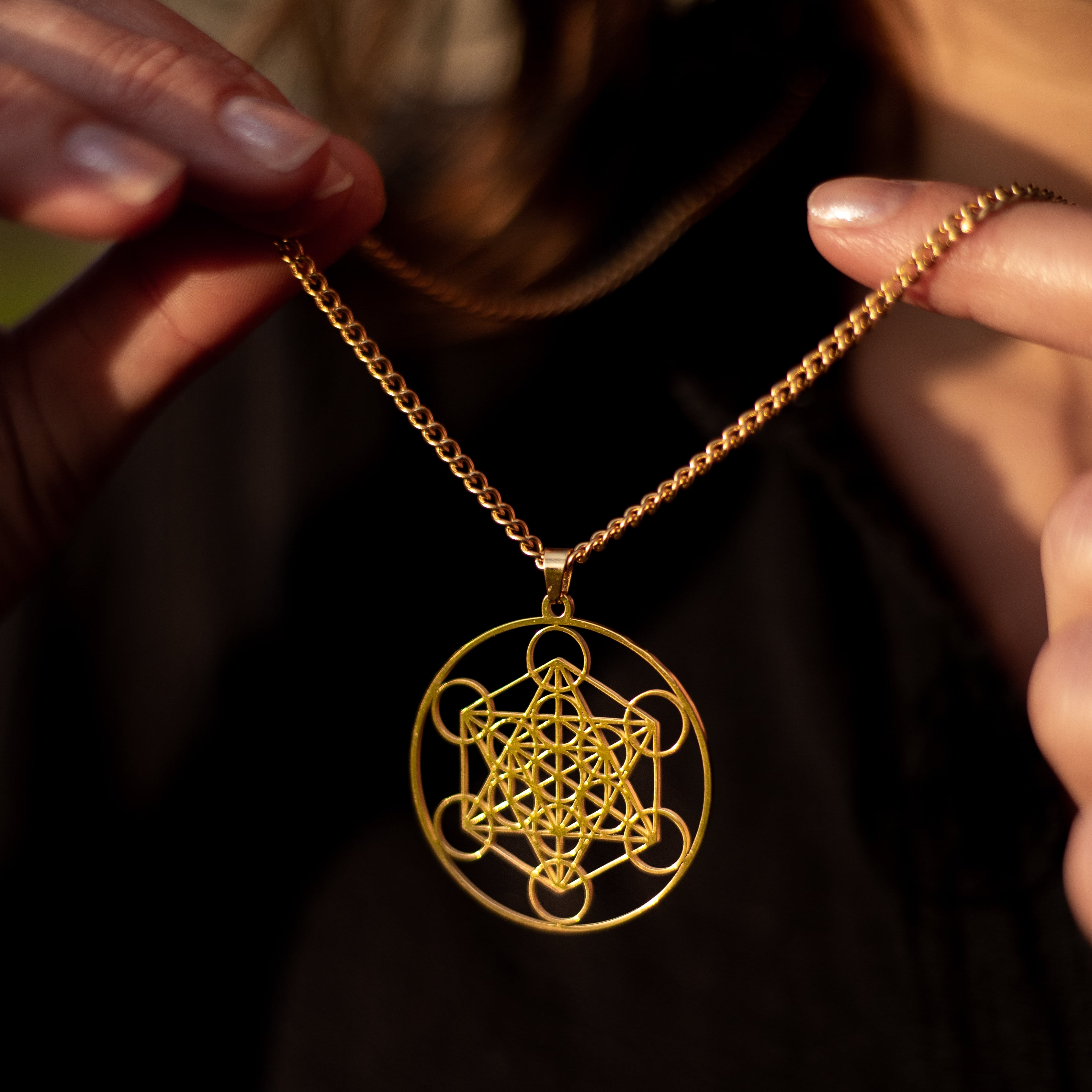 Close-up of Metatron Pendant geometric design - KARMAKIND