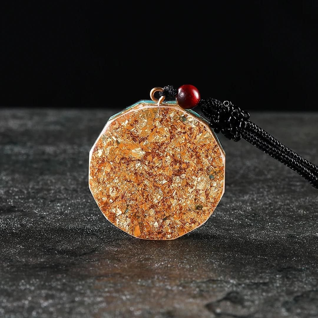 Side view of the Metatron's Cube Orgonite Pendant highlighting its thickness - KARMAKIND