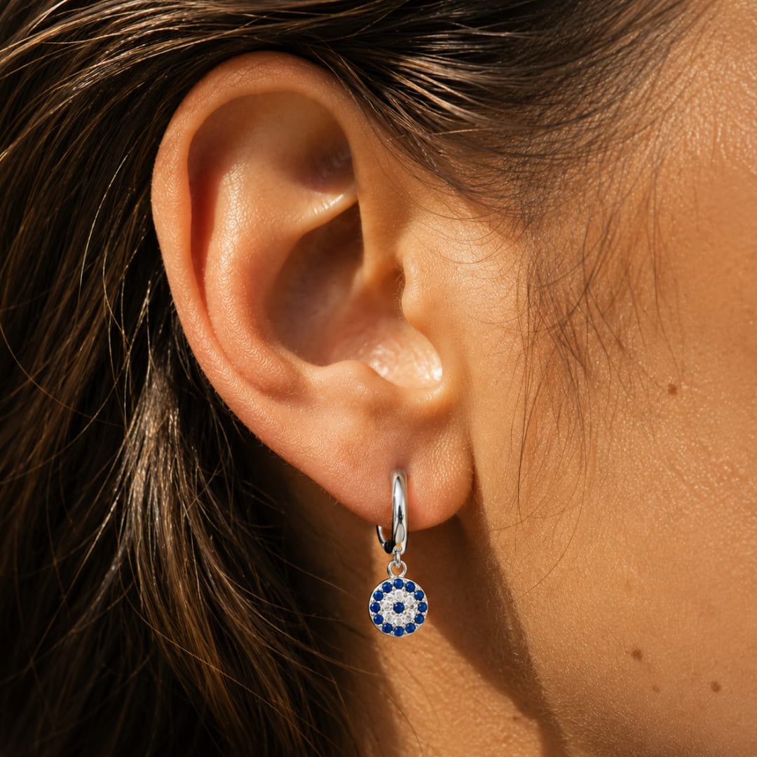 Blue Eye Earrings on a display stand - KARMAKIND