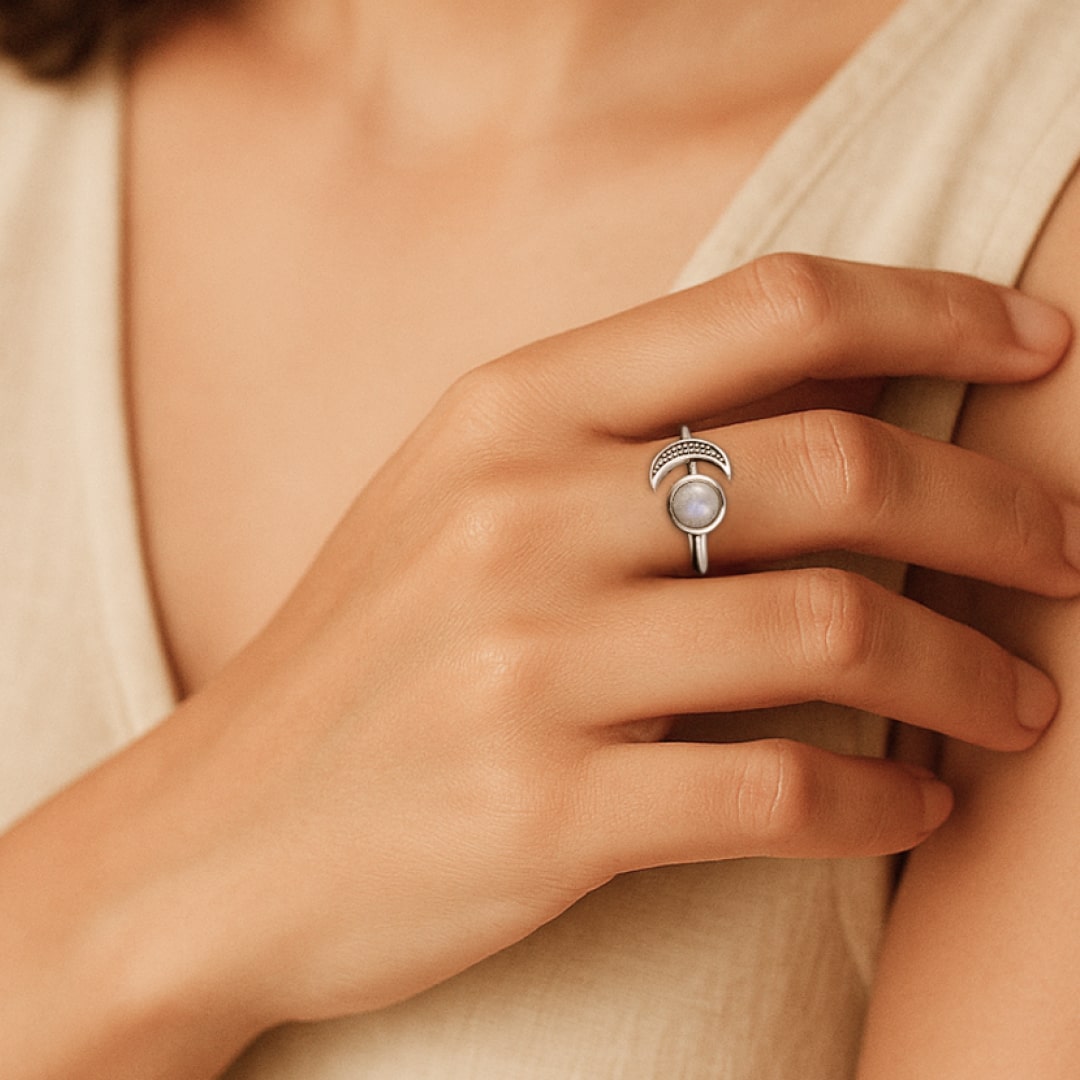 Lifestyle shot of the moonstone ring on a hand - KARMAKIND
