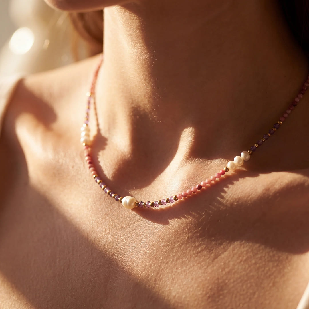 Close-up of gemstone and pearl details - KARMAKIND
