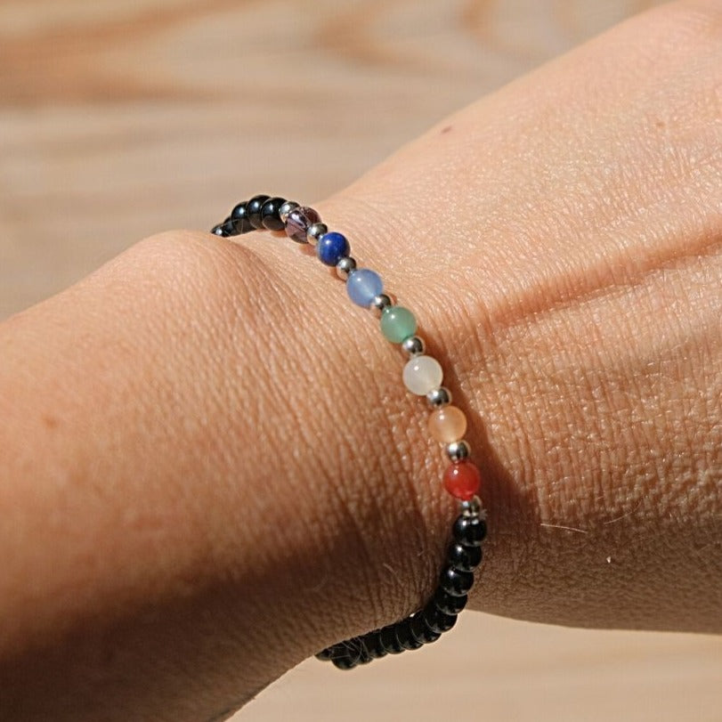 Lifestyle shot of the thin 'Chakras' bracelet