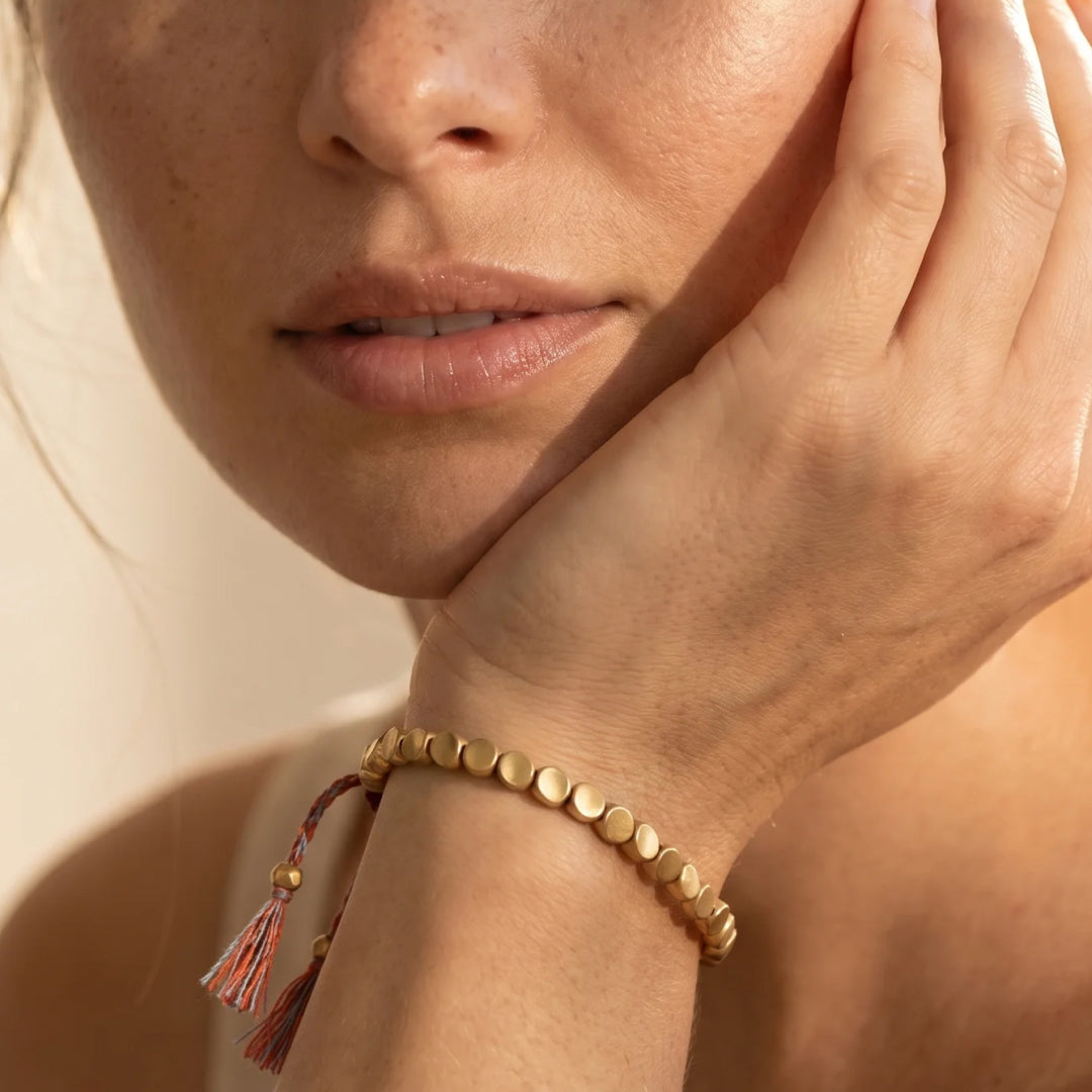 Close-up of the brass beads on the bracelet - KARMAKIND