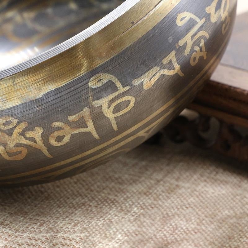 Golden motifs on Tibetan Singing Bowl - KARMAKIND