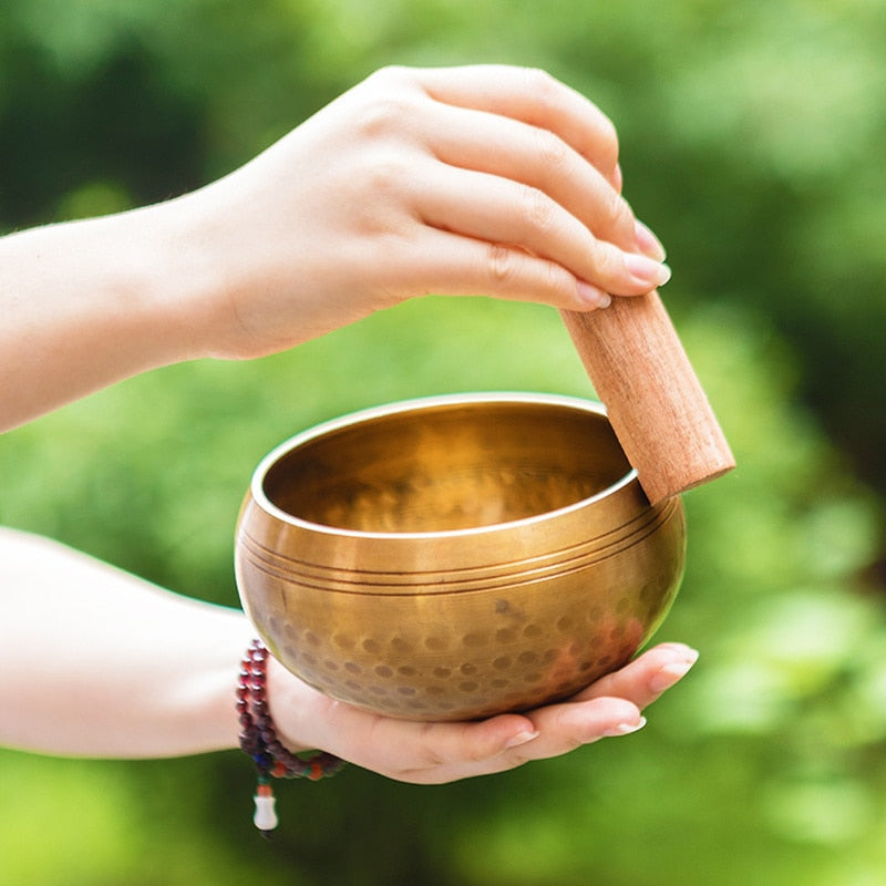 The singing bowl reflecting light - KARMAKIND