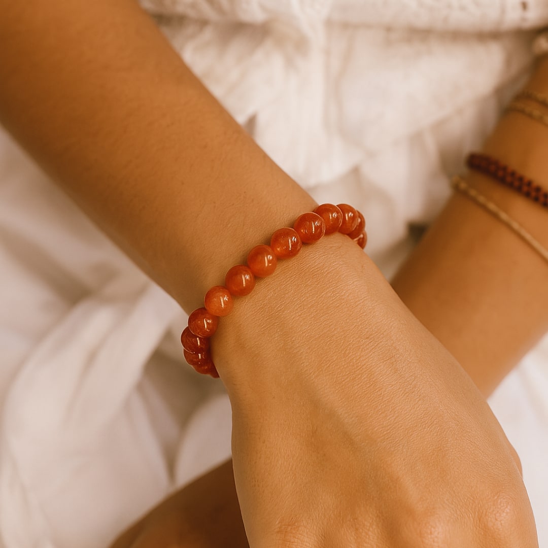 Close-up of carnelian beads, showing texture and color - KARMAKIND
