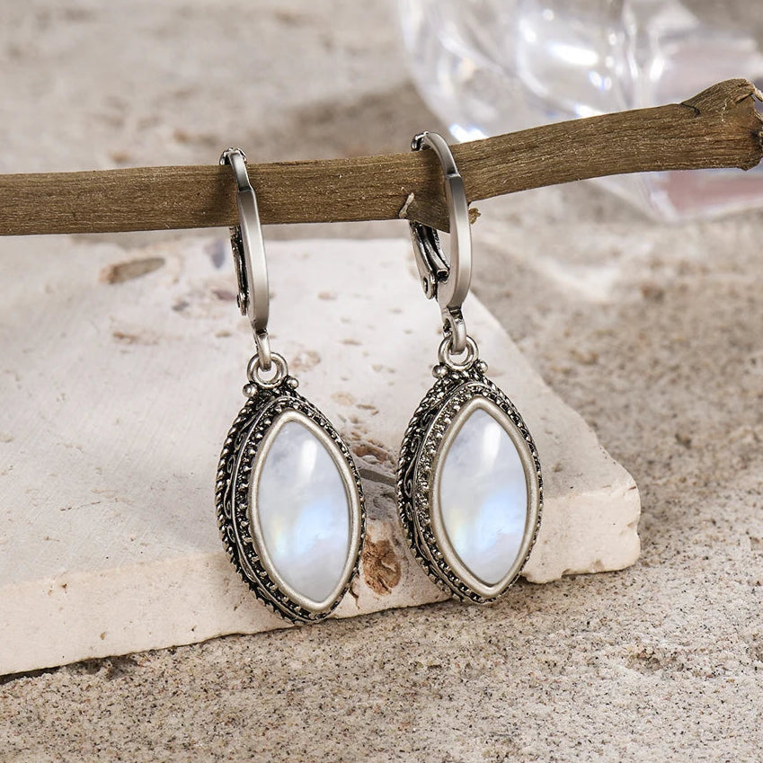 Model wearing Moonlight Earrings in Moonstone for a serene look - KARMAKIND