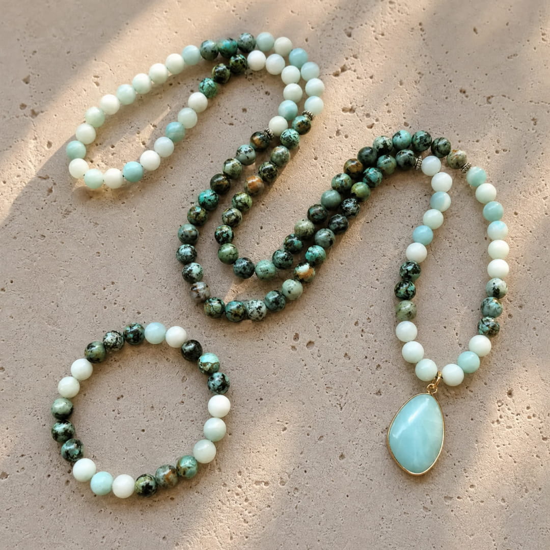 Serene lifestyle shot of someone wearing the mala necklace - KARMAKIND