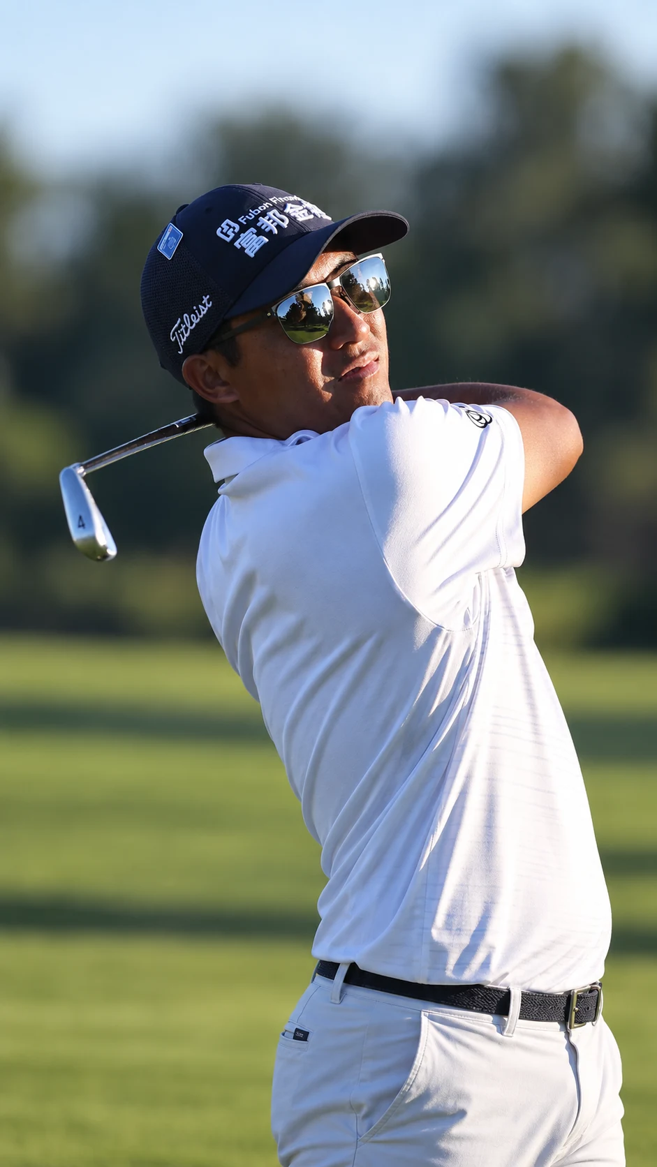 ct pan playing golf in USWING eyewear — mobile portrait composition