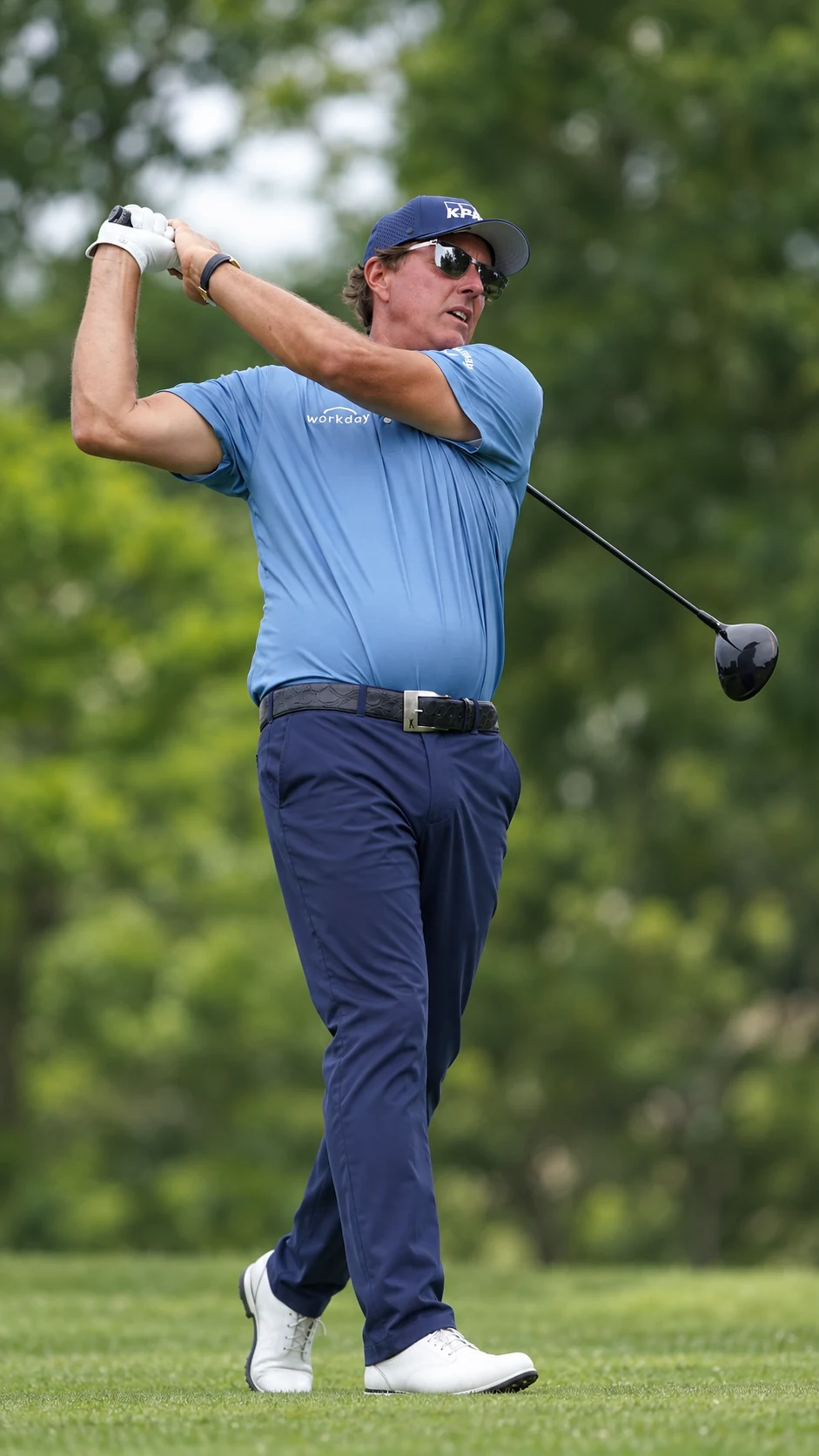 phil mickelson playing golf in USWING eyewear — mobile portrait composition