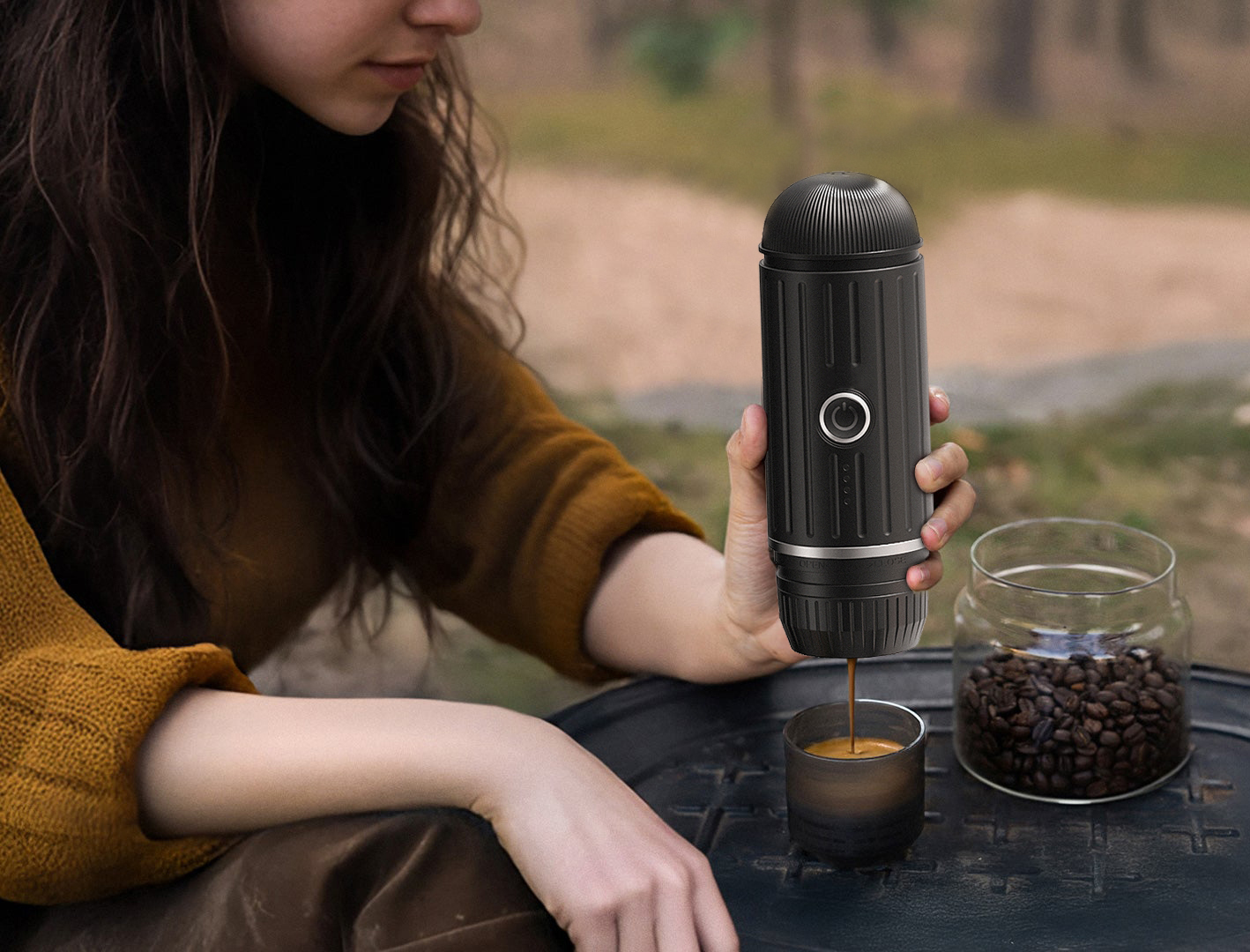 MIKOCA portable espresso machine brewing coffee outdoors