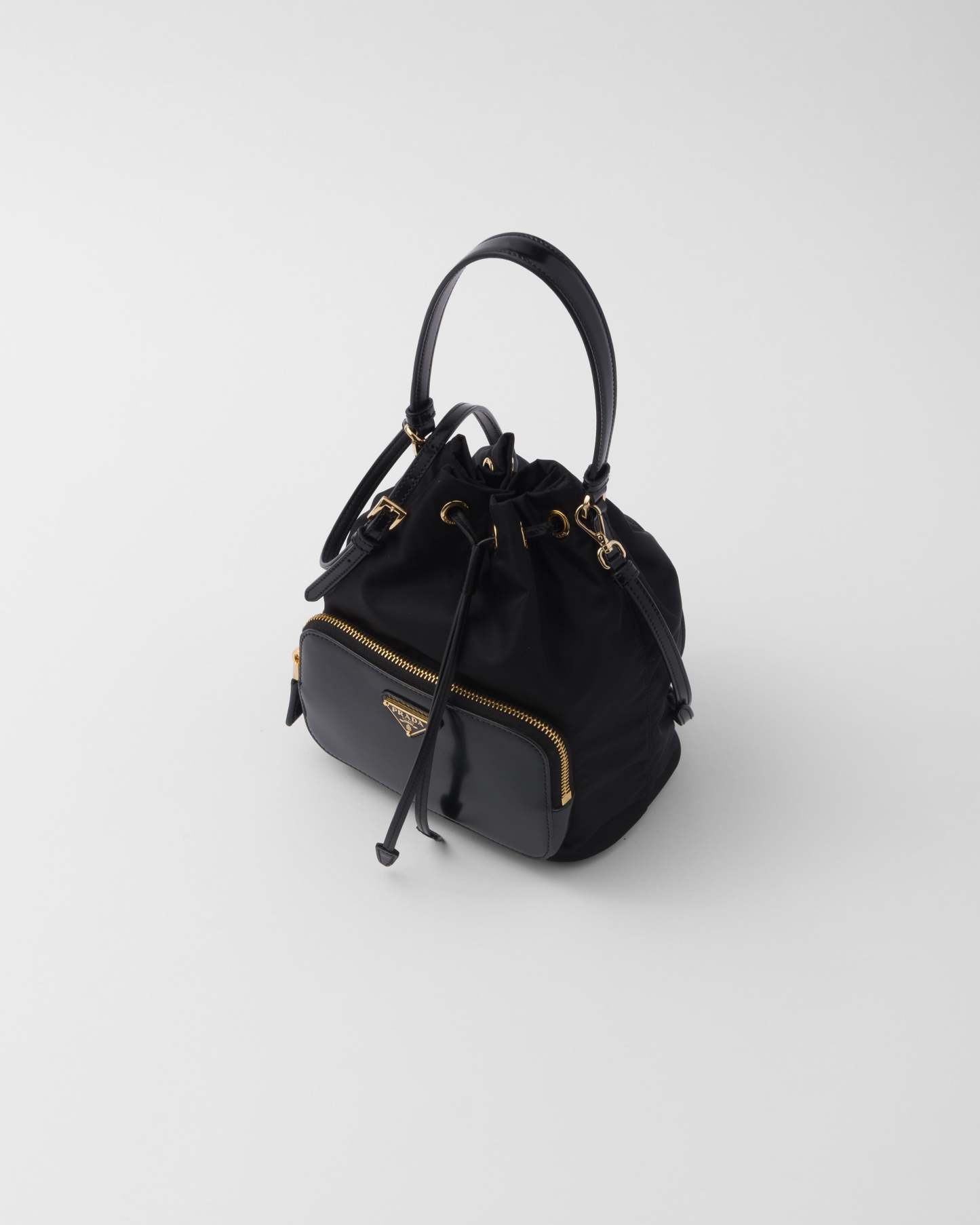 Re-Nylon xブラッシュドレザー バッグ