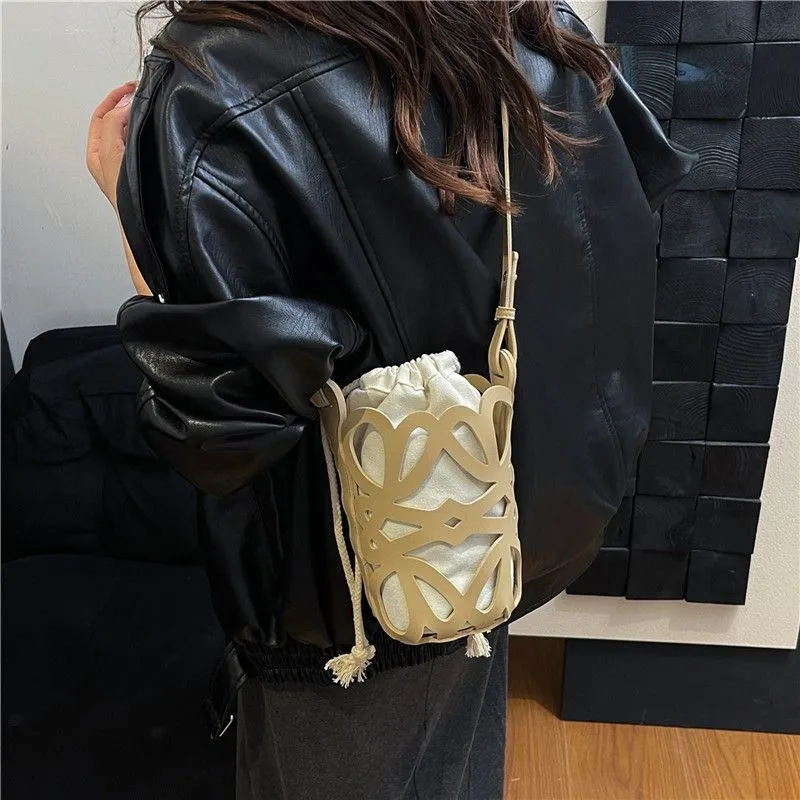 新作レディースバッグデザイン：くり抜かれた丸いバケット型ショルダーバッグ／クロスボディバッグ