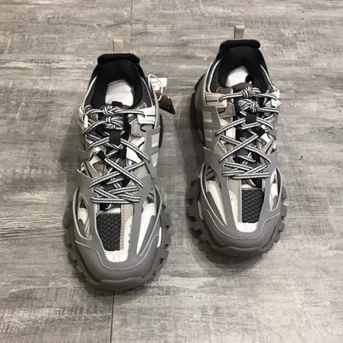 grey track trainers