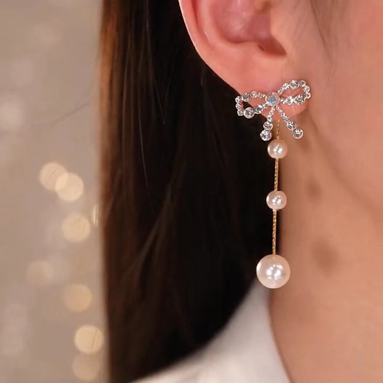 一款兩戴蝴蝶結流蘇耳環-FANYIACC