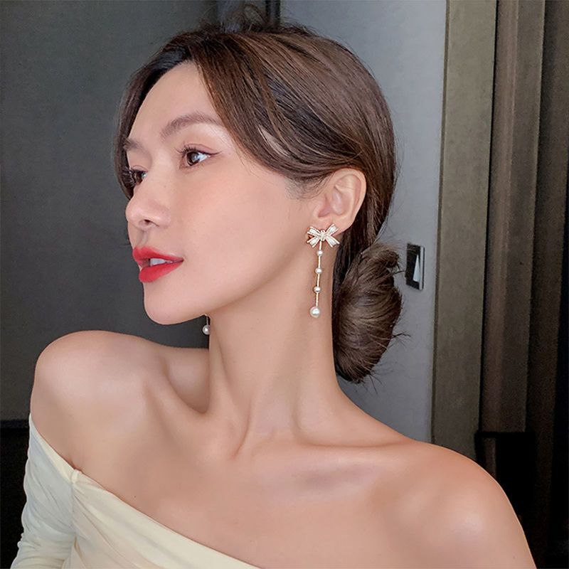 珍珠蝴蝶結流蘇耳環  -FANYIACC