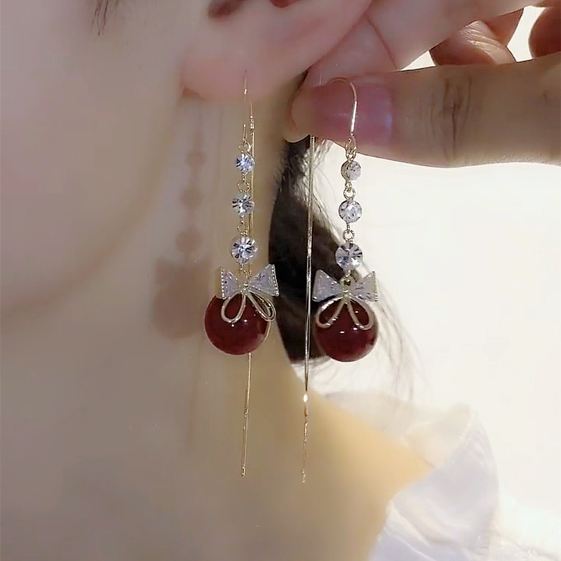 蝴蝶結珍珠流蘇耳環 -FANYIACC