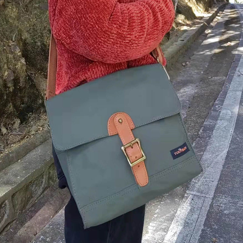 About TOURBON Canvas Bike Handlebar Messenger Storage Bag People Also Ask