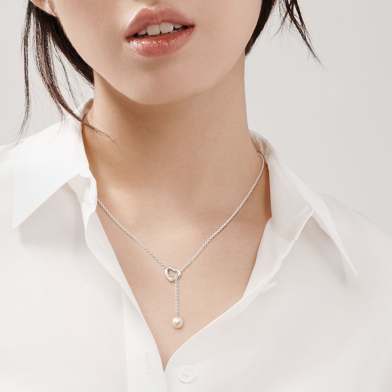 Elsa Peretti® Open Heart Lariat Necklace in Silver with Pearls, 7.5-8 mm - Alternate shot 1 - Alternate shot 2 - Modal shot 1