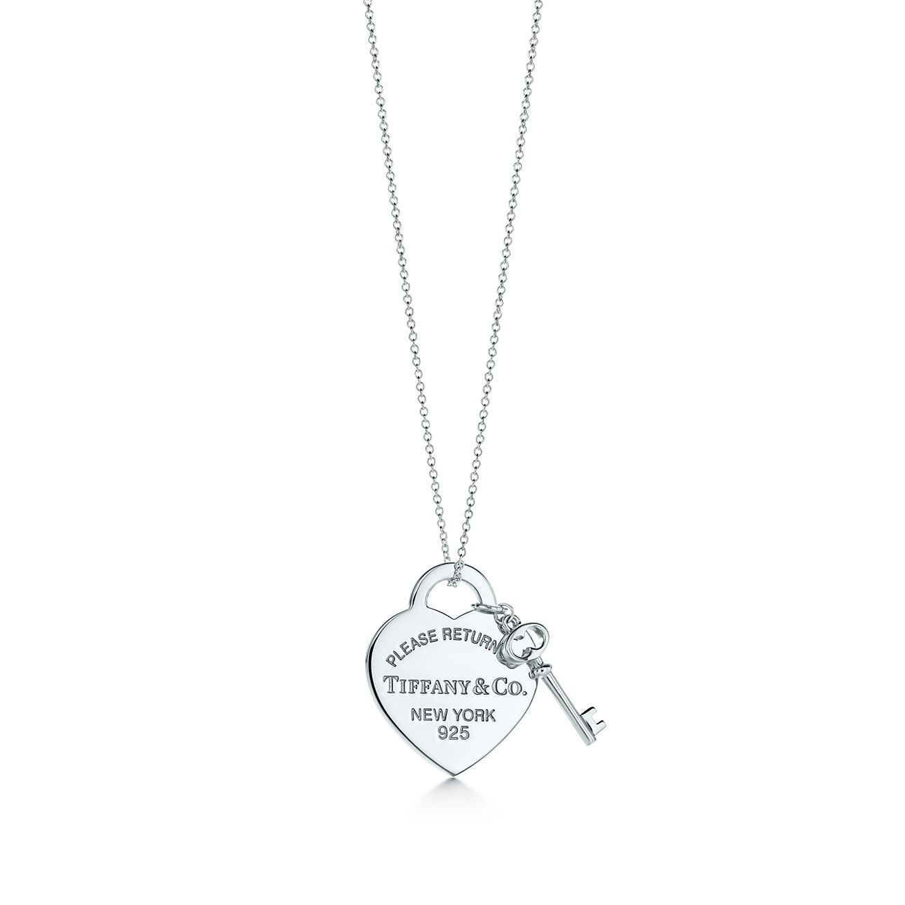 Return to Tiffany® medium heart tag with key pendant in sterling silver.