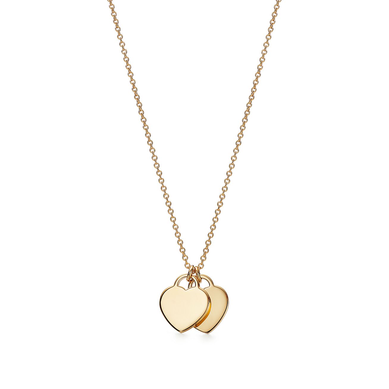 Return to Tiffany® mini double heart tag pendant in 18k gold. - Alternate shot 1