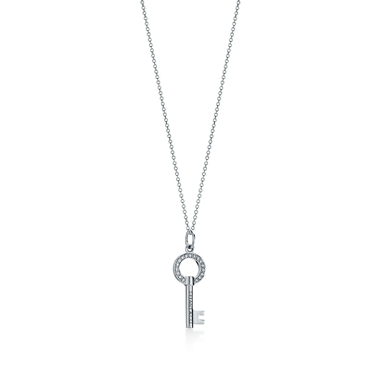 Tiffany Keys modern keys open round key pendant in 18k white gold with diamonds.