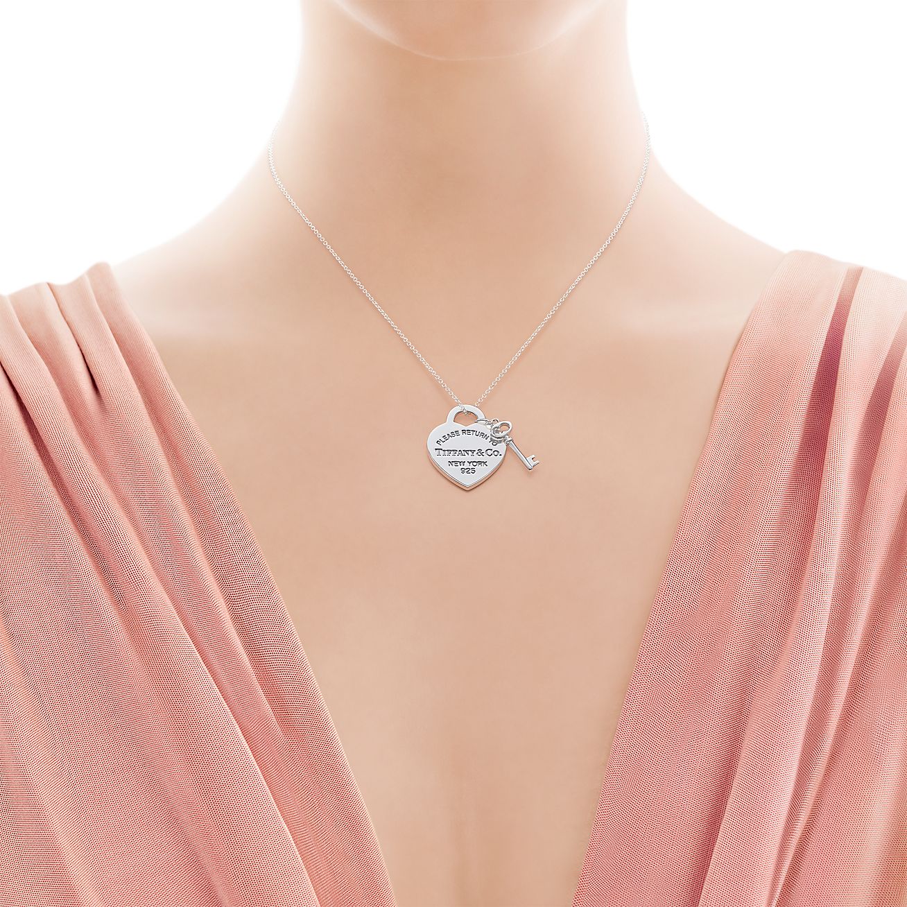 Return to Tiffany® medium heart tag with key pendant in sterling silver. - Modal shot 1