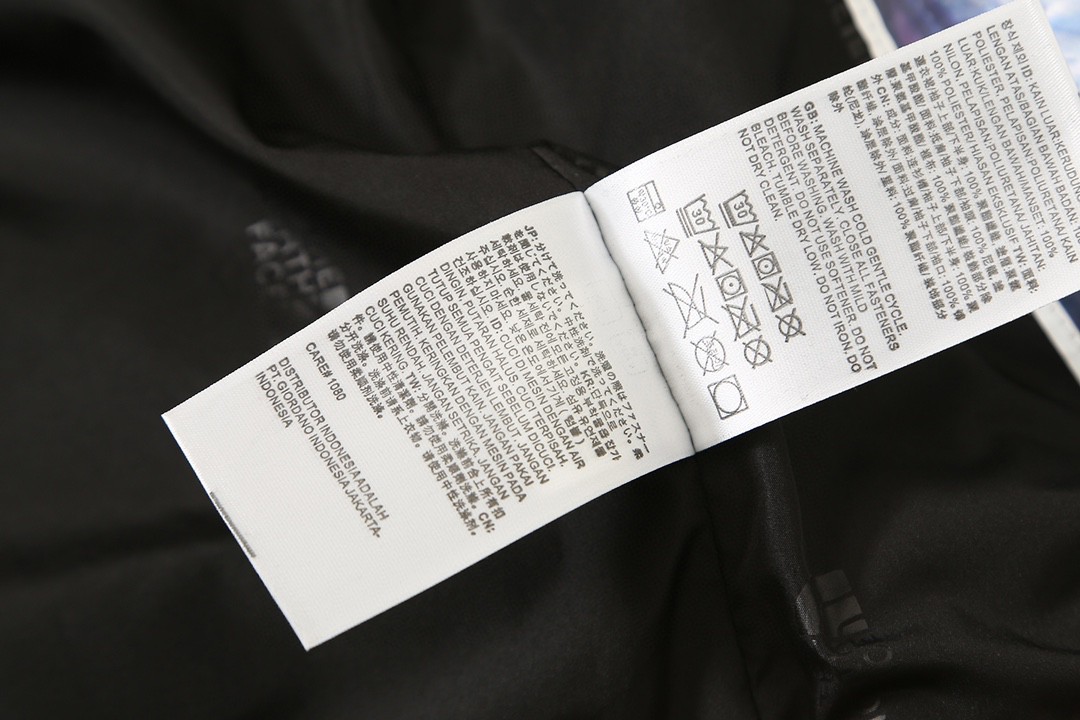 THE NORTH FACE 北面 新春兔年限定系列  ICON 1986品牌 Logo 迷彩印花 棕色 灰色 冲锋衣 夾克 防水 防風 外套 男款 女款 NF0A7UR9-II7