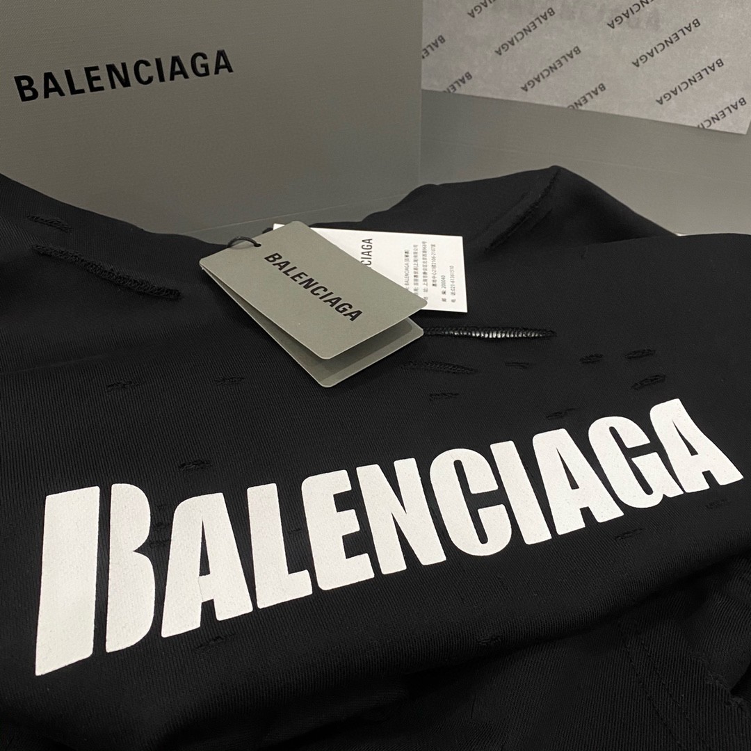 Balenciaga 巴黎世家 SS22 Caps Destroyed 艺术印花裂纹设计破洞裂纹效果 连帽卫衣 套头 卫衣 宽松 男女同款 黑色 659403TKVB61093