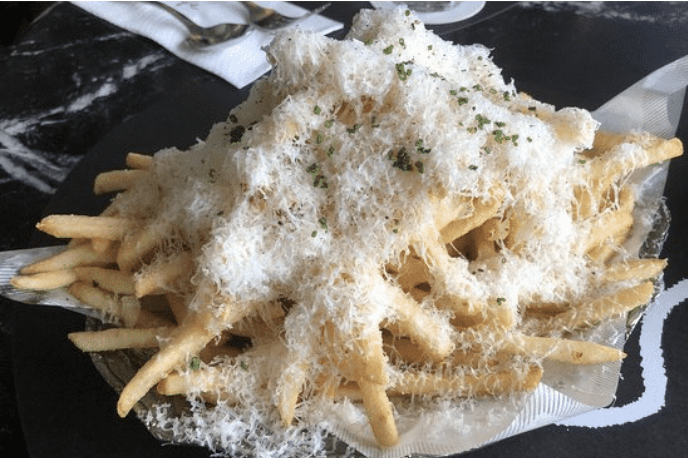 Truffle-Induced Fries with Cheese Shavings-Gourmet.ly