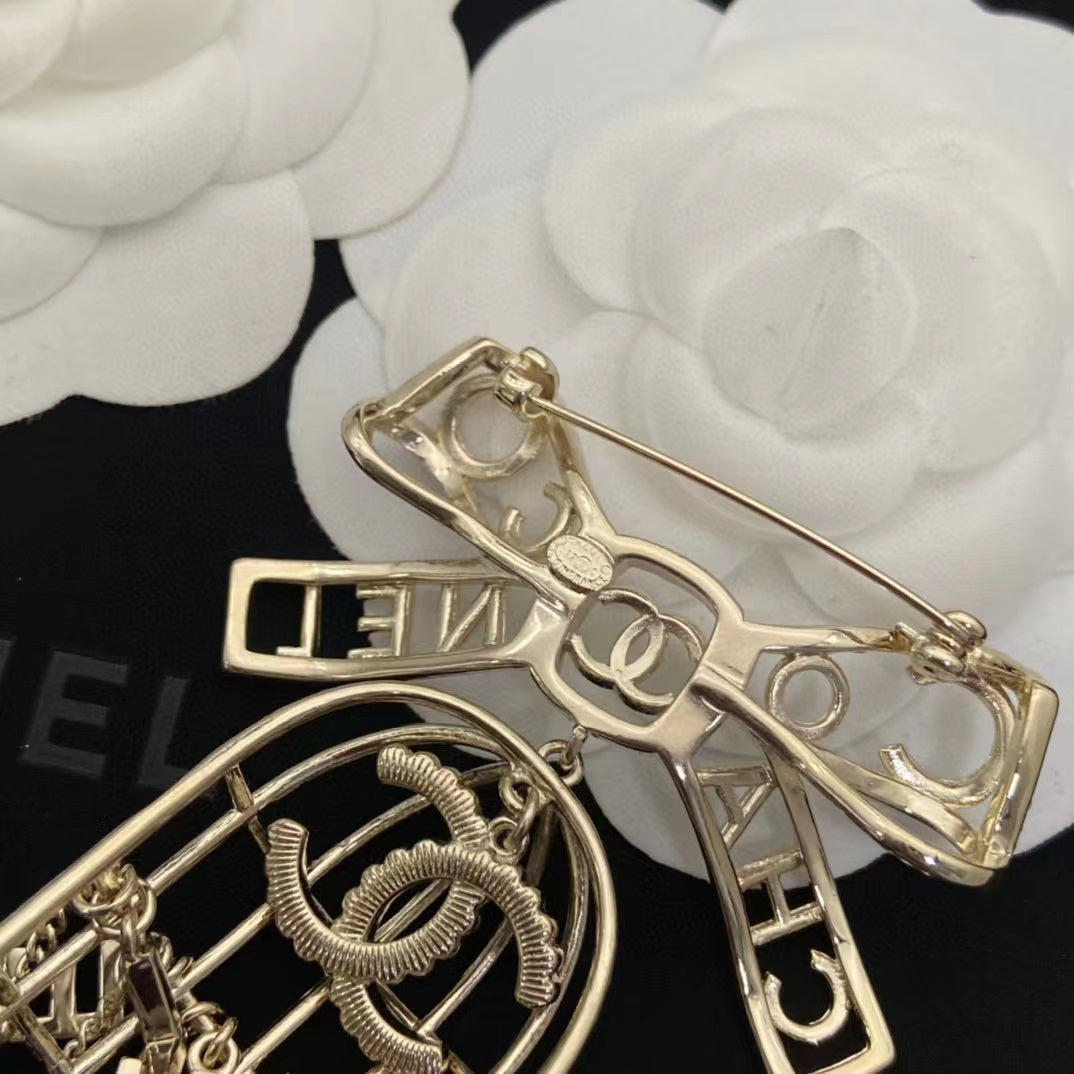 CHANE1 ボウバードケージブローチ【 50％割引+送料無料】