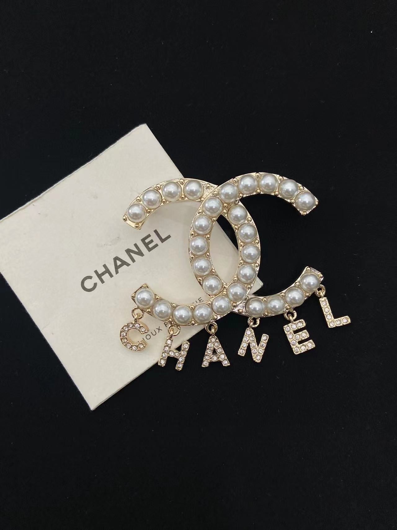 CHANE1 CC パールタッセルブローチ【50％割引+送料無料】