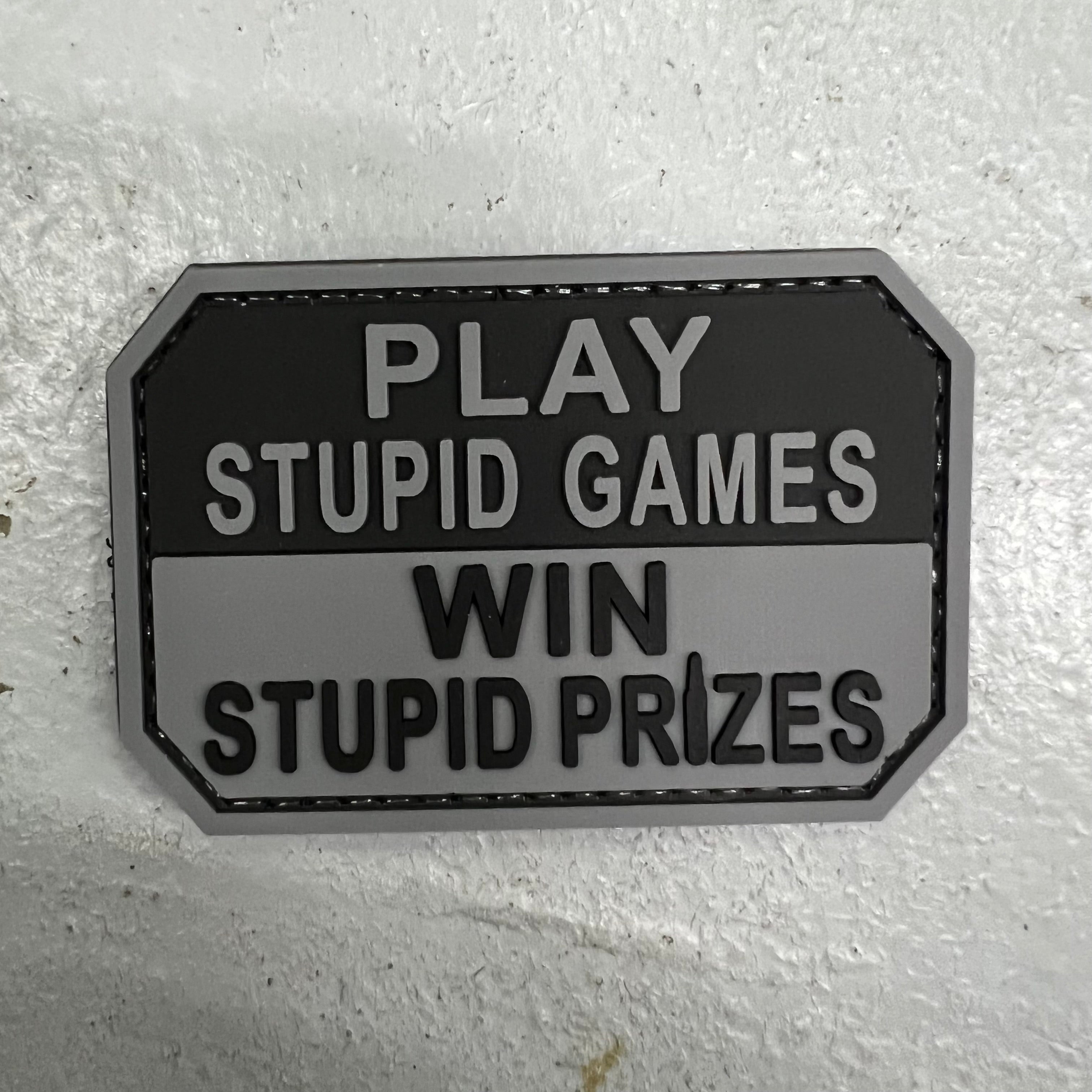 Rubber Patch - Play Stupid Games,Win Stupid Prizes