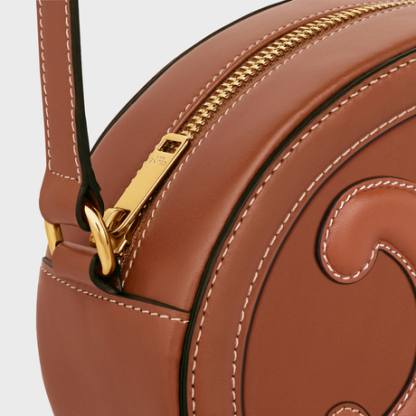 OVAL BAG CUIR TRIOMPHE IN SMOOTH CALFSKIN TAN
